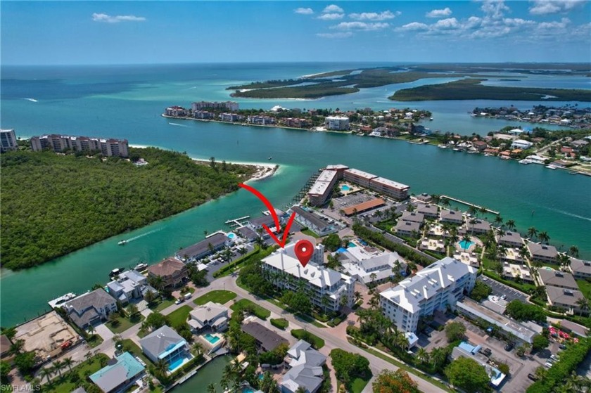 Location! Amazing Water Views! This 4th-floor property offers an - Beach Condo for sale in Marco Island, Florida on Beachhouse.com