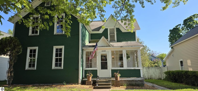 This storybook Victorian in the heart of Empire Village has been - Beach Home for sale in Empire, Michigan on Beachhouse.com
