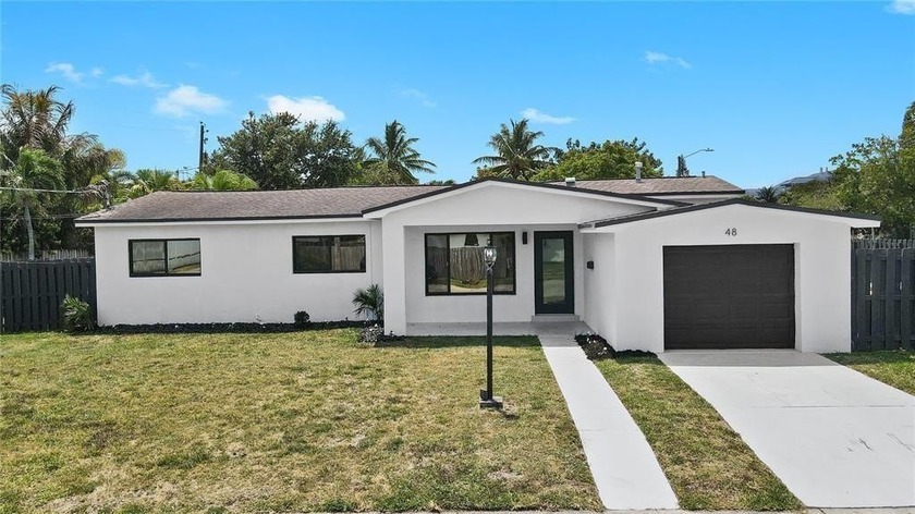 Welcome to this beautifully renovated 4-bedroom, 3-bath home - Beach Home for sale in Hollywood, Florida on Beachhouse.com