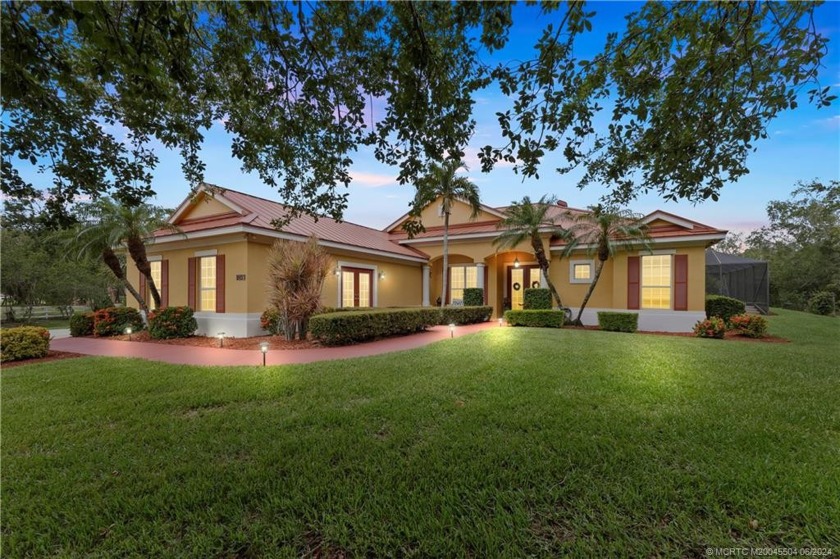 Welcome to this stunning CBS four-bedroom, three-bath home - Beach Home for sale in Palm City, Florida on Beachhouse.com