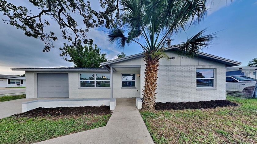 Welcome to 3608 Chauncy Rd, a completely remodeled gem in the - Beach Home for sale in Holiday, Florida on Beachhouse.com