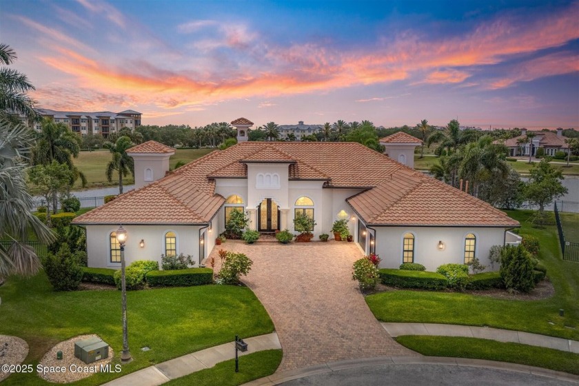 This meticulously crafted custom home, in the exclusive gated - Beach Home for sale in Melbourne, Florida on Beachhouse.com