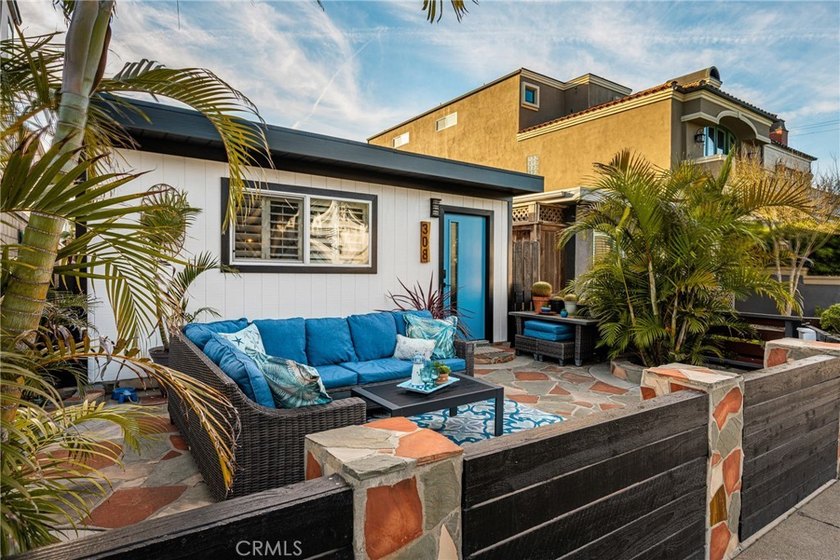 Just a few blocks from the sand, this classic Huntington Beach - Beach Home for sale in Huntington Beach, California on Beachhouse.com