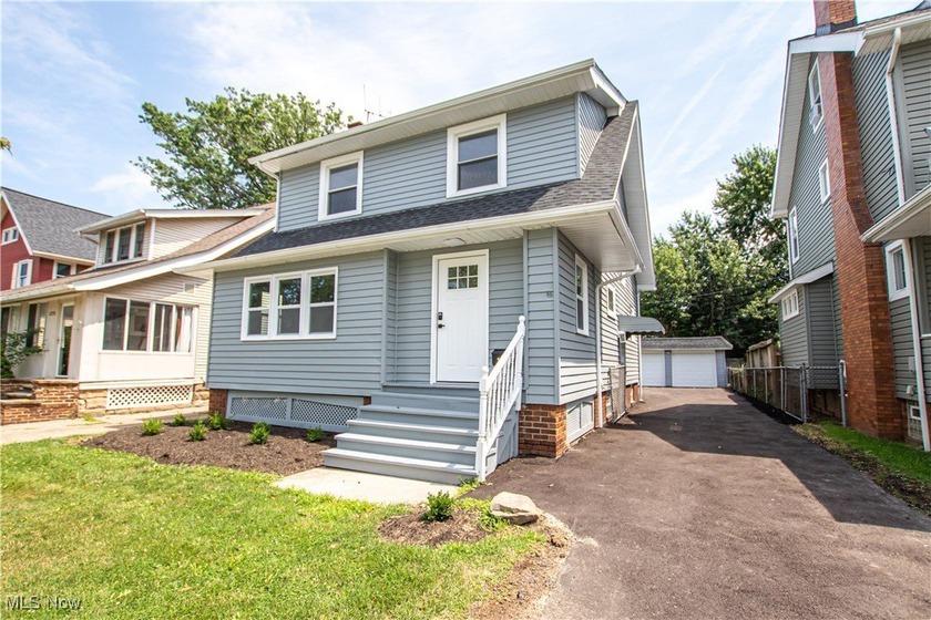Welcome to this masterfully renovated 4-bedroom, 3-bathroom Cape - Beach Home for sale in Lakewood, Ohio on Beachhouse.com
