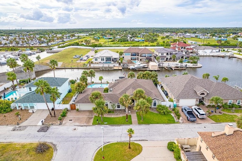 Welcome to this stunning waterfront home, offering quick access - Beach Home for sale in Aransas Pass, Texas on Beachhouse.com