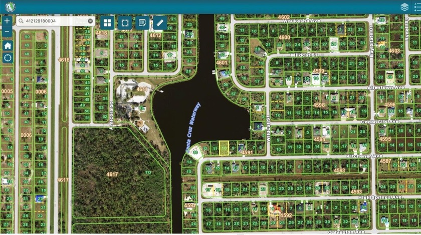 Enjoy expansive lakefront living at 13232 Kitchener Ave in Port - Beach Lot for sale in Port Charlotte, Florida on Beachhouse.com