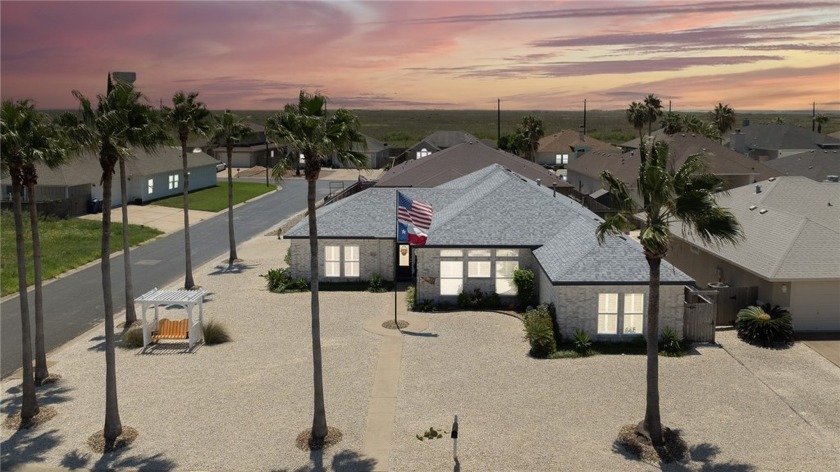 Discover island living in this captivating 4-bed, 2-bath home on - Beach Home for sale in Corpus Christi, Texas on Beachhouse.com