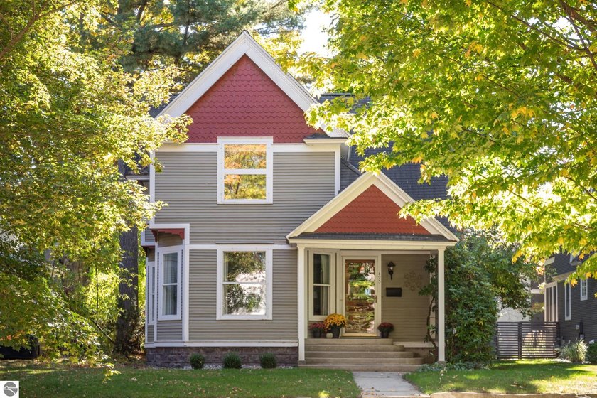 EXPERIENCE THE BEST OF DOWNTOWN TRAVERSE CITY LIVING in this - Beach Home for sale in Traverse City, Michigan on Beachhouse.com