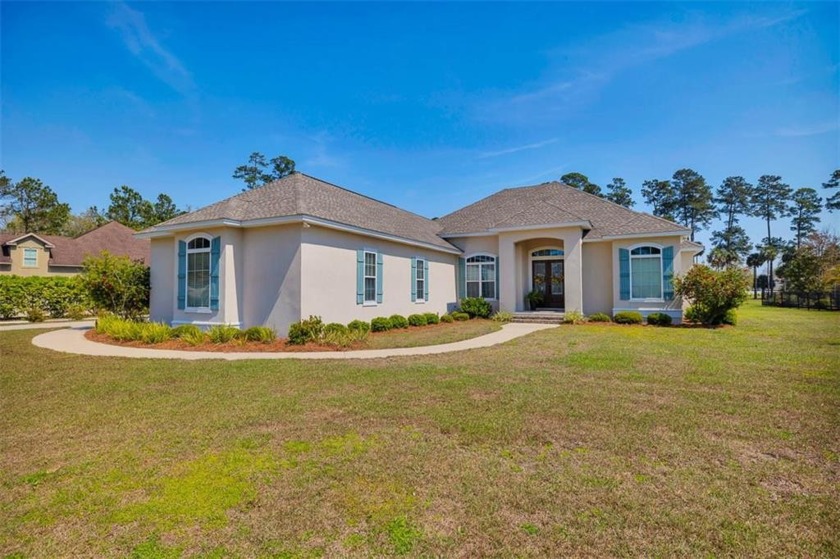 Welcome to this luxurious 4-bedroom, 3-bathroom home nestled in - Beach Home for sale in Brunswick, Georgia on Beachhouse.com