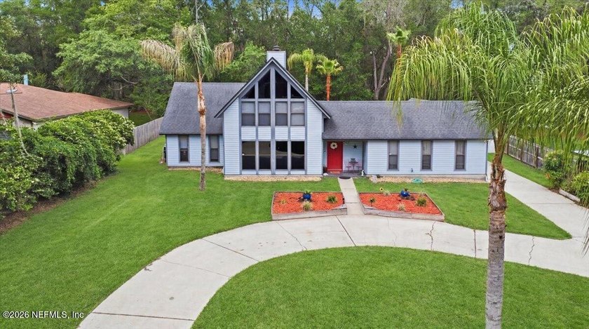 Nestled on a beautiful one-acre homesite in sought-after Lake - Beach Home for sale in Green Cove Springs, Florida on Beachhouse.com