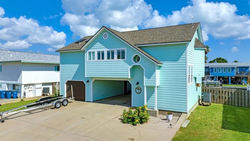 Classic coastal living in this open floor plan canal home in Key - Beach Home for sale in Rockport, Texas on Beachhouse.com