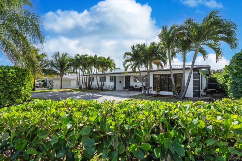 Step into this stunning single-family oasis, where comfort meets - Beach Home for sale in Lake Worth Beach, Florida on Beachhouse.com