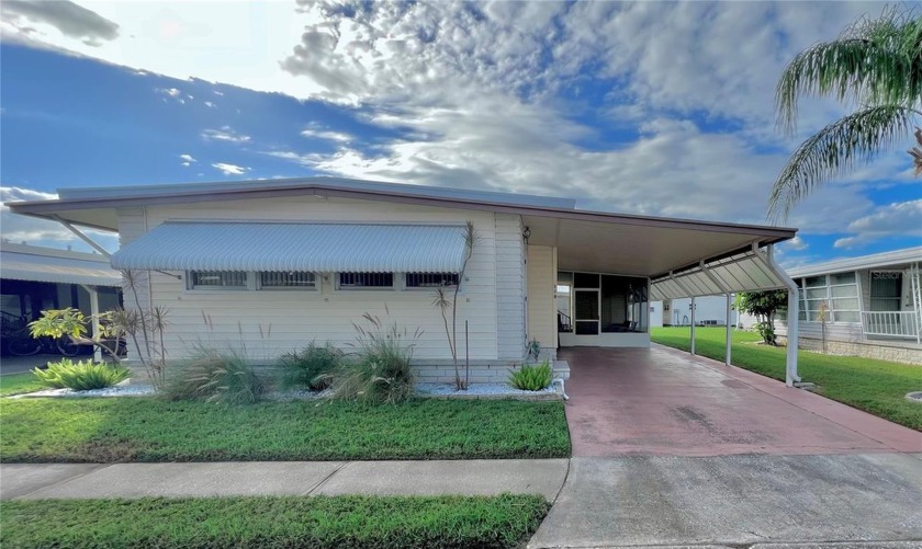 Welcome to this beautifully updated 2-bedroom, 2-bathroom home - Beach Home for sale in Largo, Florida on Beachhouse.com