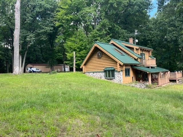 Log home on 4.9 acres with frontage on the Portage River - Beach Home for sale in Vicksburg, Michigan on Beachhouse.com