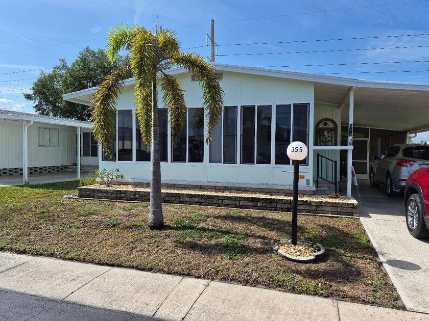 MORE PHOTOS TO COME!! NICE DOUBLEWIDE HOME ON A LOVELY STREET - Beach Home for sale in North Fort Myers, Florida on Beachhouse.com