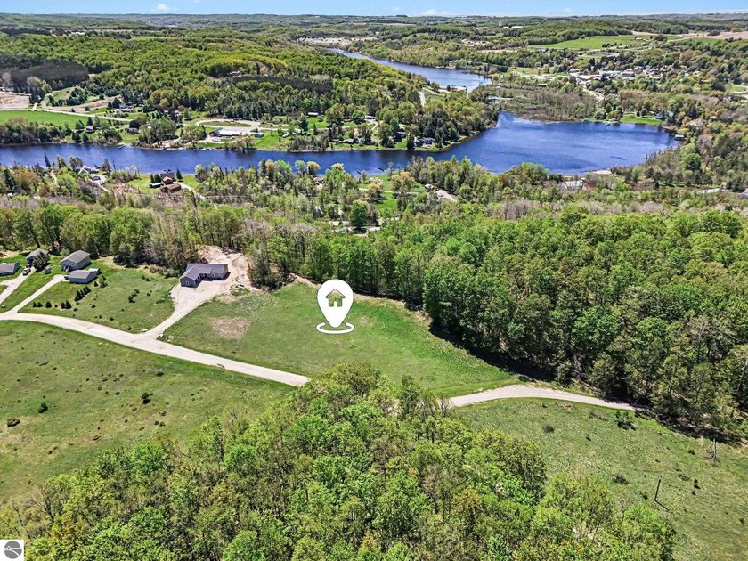 Discover 3.5 acres of Northern Michigan beauty with an elevated - Beach Acreage for sale in Ellsworth, Michigan on Beachhouse.com