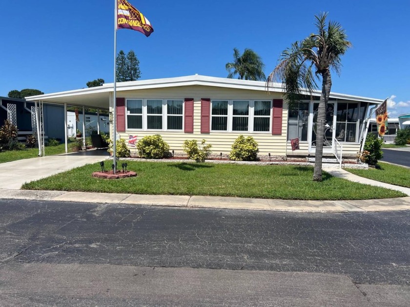 Enjoy the scenic surroundings on an appealing corner lot in - Beach Home for sale in Largo, Florida on Beachhouse.com