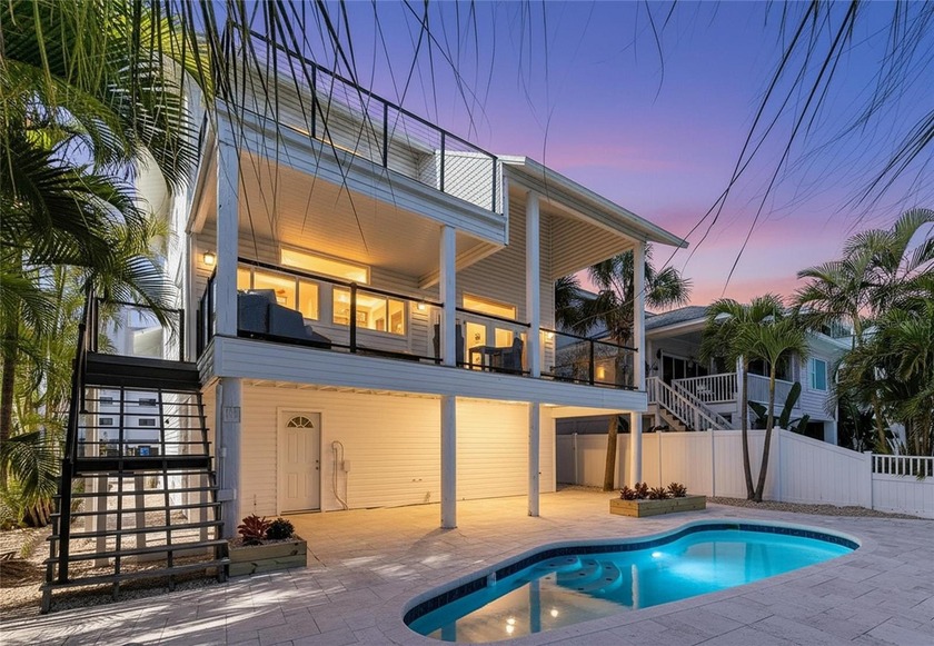 Perfectly situated where Blind Pass opens into a quiet cove - Beach Home for sale in Treasure Island, Florida on Beachhouse.com