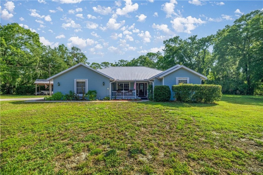 This beautifully maintained pool home is located in the heart of - Beach Home for sale in Yankeetown, Florida on Beachhouse.com