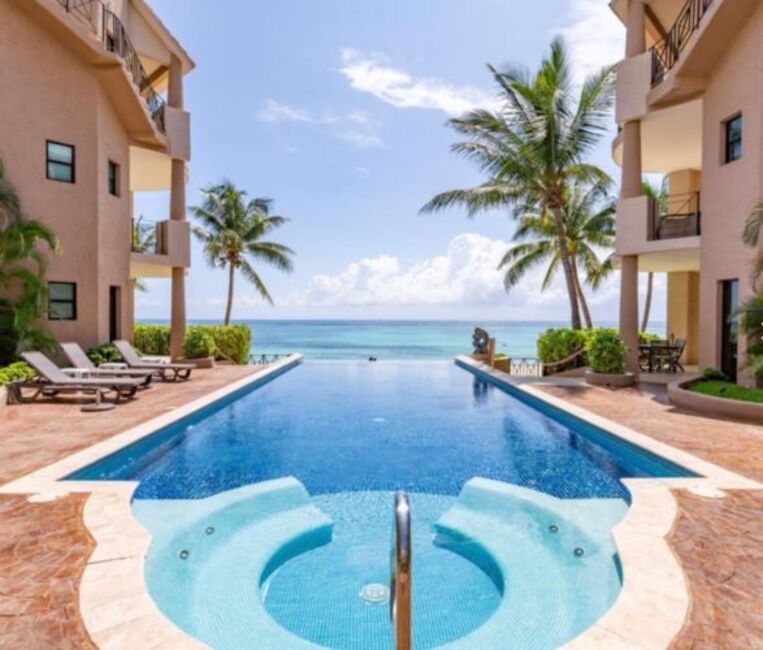 Experience the ultimate oceanfront living in this stunning - Beach Condo for sale in Playa Del Carmen,  on Beachhouse.com