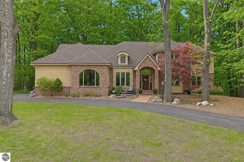10481 S Monaco Way offers a rare opportunity to experience - Beach Home for sale in Traverse City, Michigan on Beachhouse.com