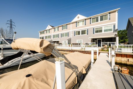 THIS EXCEPTIONAL PROPERTY OFFERS 4 BEDROOMS AND 5 FULL BATHROOMS - Beach Condo for sale in Saint Joseph, Michigan on Beachhouse.com