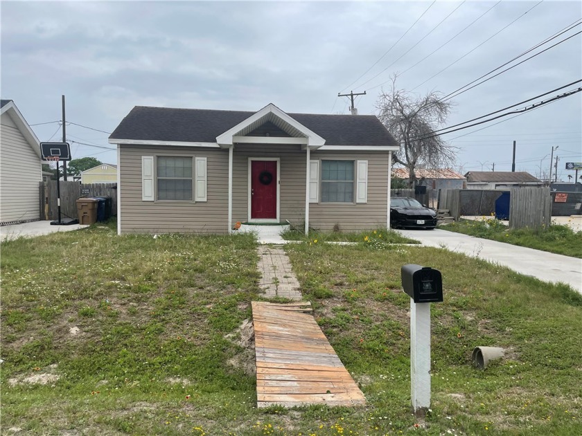 GREAT OPPORTUNITY TO OWN THREE HOMES AND A VACANT LOT! Zoned - Beach Home for sale in Corpus Christi, Texas on Beachhouse.com