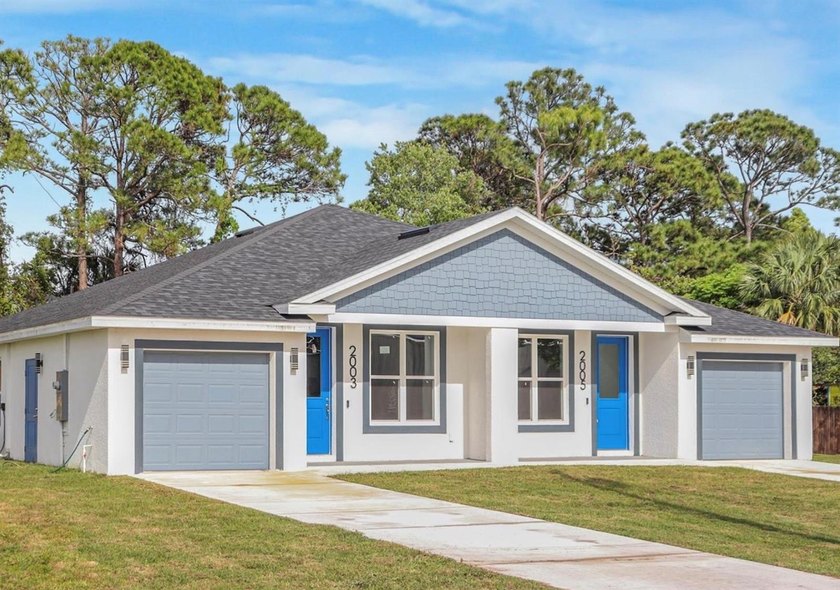 Welcome to this stunning new duplex just minutes from the - Beach Townhome/Townhouse for sale in Edgewater, Florida on Beachhouse.com