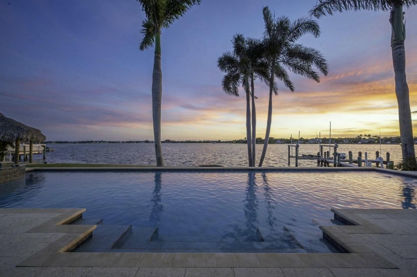 Tucked away in Tequesta Country Club, this extraordinary 193' - Beach Home for sale in Tequesta, Florida on Beachhouse.com