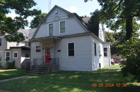 Offering a wonderful home on one of the prettiest streets in the - Beach Home for sale in Benton Harbor, Michigan on Beachhouse.com