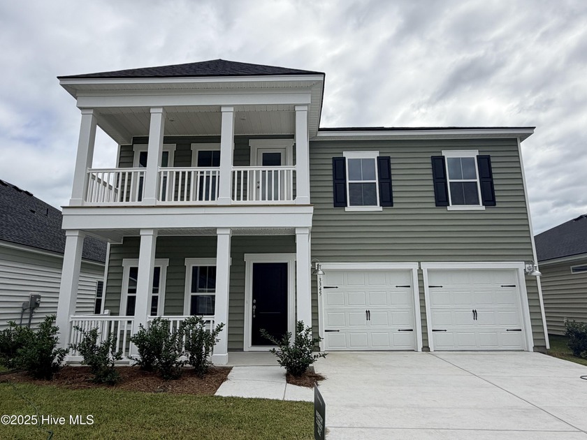 This spacious two-story home features a formal dining room and - Beach Home for sale in Ocean Isle Beach, North Carolina on Beachhouse.com