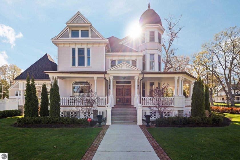 Few homes stop you in your tracks the way this one does. Built - Beach Home for sale in Traverse City, Michigan on Beachhouse.com