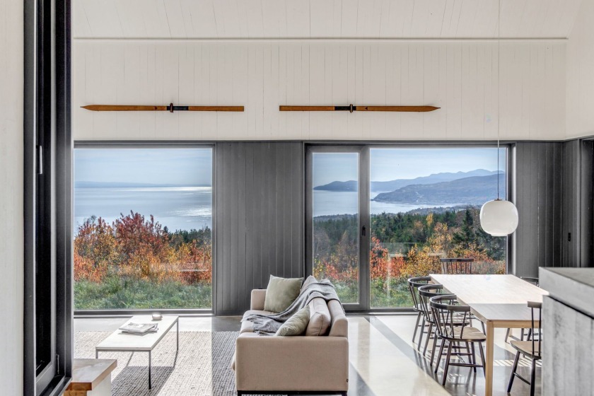 Les Rorquals. Cette maison de style rustique, aux lignes epurees - Beach Home for sale in La Malbaie,  on Beachhouse.com