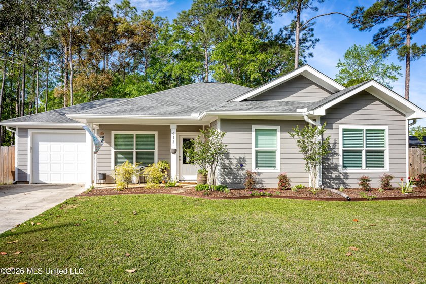 Tucked away in a charming coastal town, this 4-bedroom, 2-bath - Beach Home for sale in Ocean Springs, Mississippi on Beachhouse.com