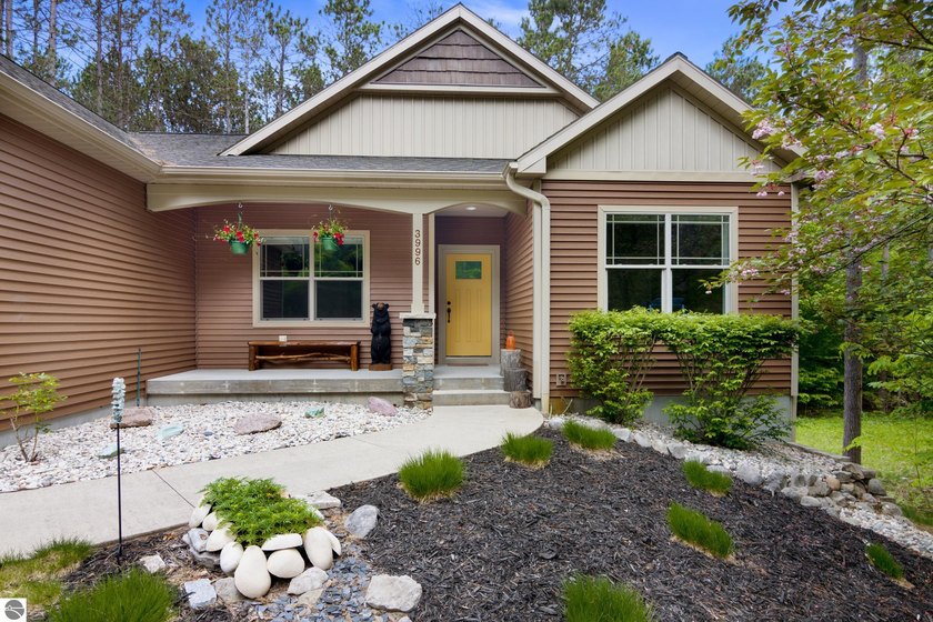 Tucked into a quiet Leelanau County neighborhood just minutes - Beach Home for sale in Empire, Michigan on Beachhouse.com