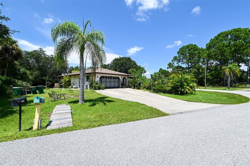 Lush tropical property located in the lovely community of - Beach Home for sale in Englewood, Florida on Beachhouse.com