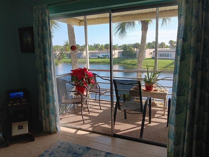Motivated seller! Large 2nd floor corner 2/2 unit with beautiful - Beach Condo for sale in West Palm Beach, Florida on Beachhouse.com