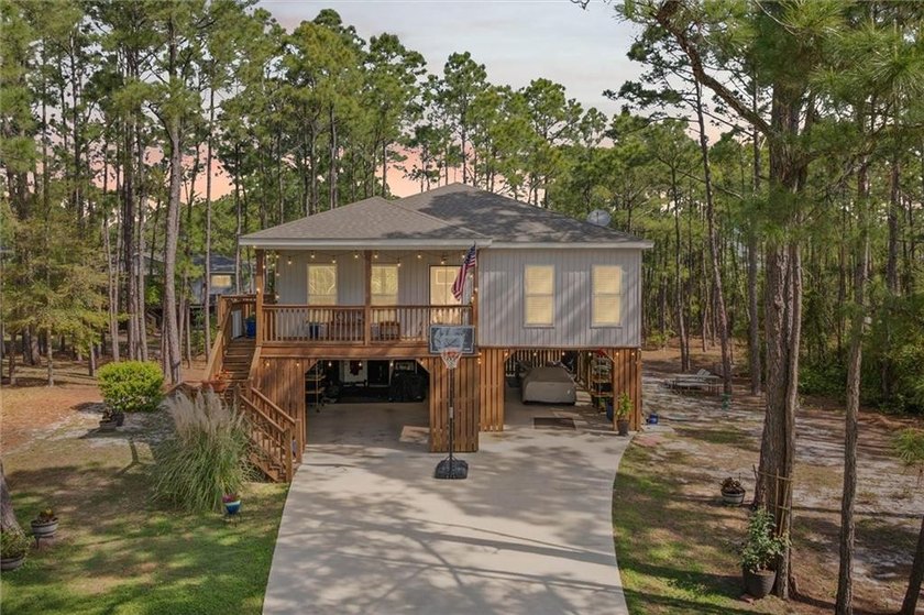 This beautiful Dauphin Island home is the epitome of Island - Beach Home for sale in Dauphin Island, Alabama on Beachhouse.com