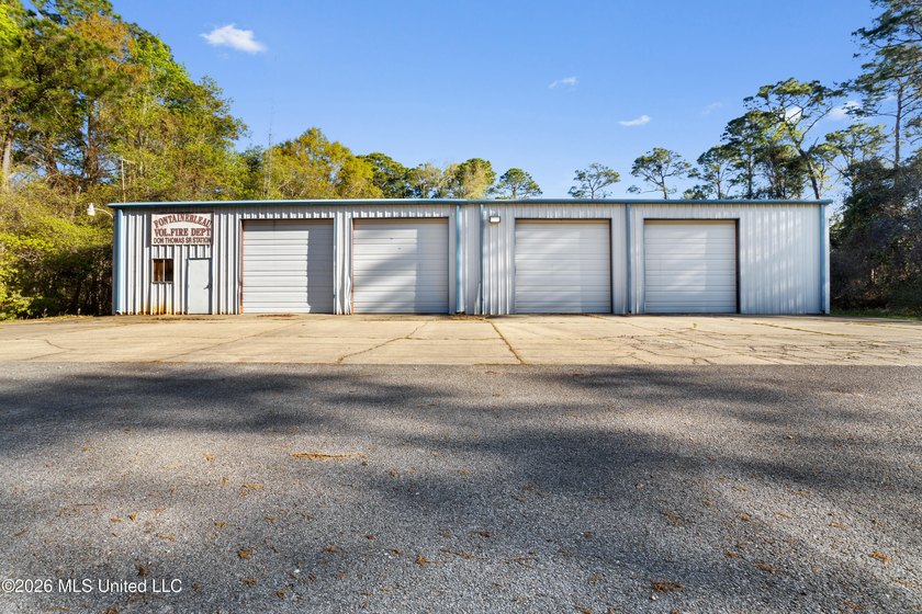 This 5,000-square-foot building, formerly operated as a county - Beach Lot for sale in Ocean Springs, Mississippi on Beachhouse.com