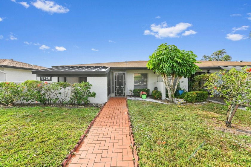 Nestled in the highly desirable Palm Greens community, this - Beach Home for sale in Delray Beach, Florida on Beachhouse.com