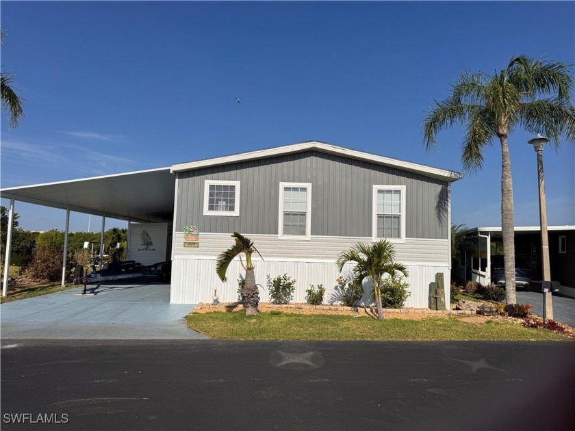 New 2023 elevated manufactured home on the Orange River with its - Beach Home for sale in Fort Myers, Florida on Beachhouse.com