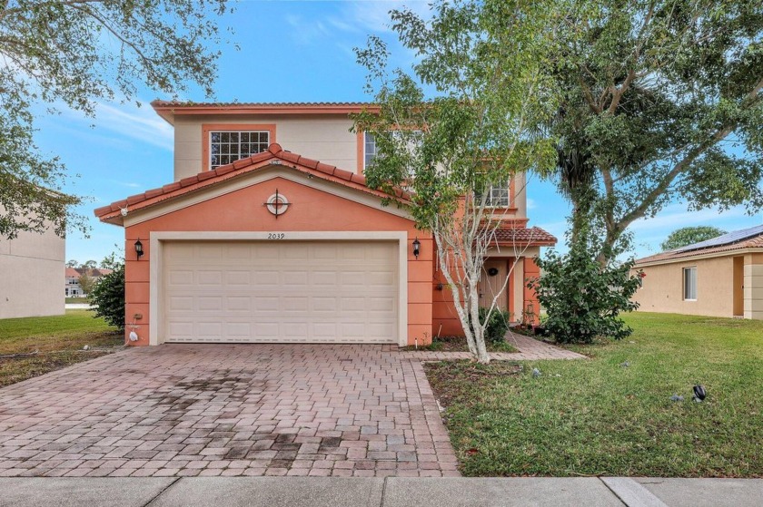 Discover this stunning 4/2.5/2 two-story home in the highly - Beach Home for sale in Port Saint Lucie, Florida on Beachhouse.com