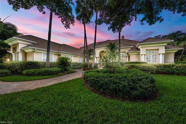 Come discover this magnificent estate home situated on almost an - Beach Home for sale in Naples, Florida on Beachhouse.com
