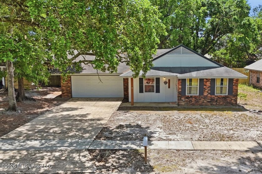 Meet your coastal unicorn a rare, move-in-ready gem in the - Beach Home for sale in Gulfport, Mississippi on Beachhouse.com