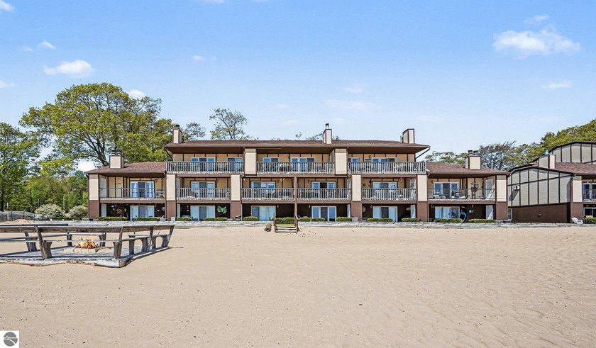 Experience lakefront living at its finest! This stunning - Beach Condo for sale in Oscoda, Michigan on Beachhouse.com