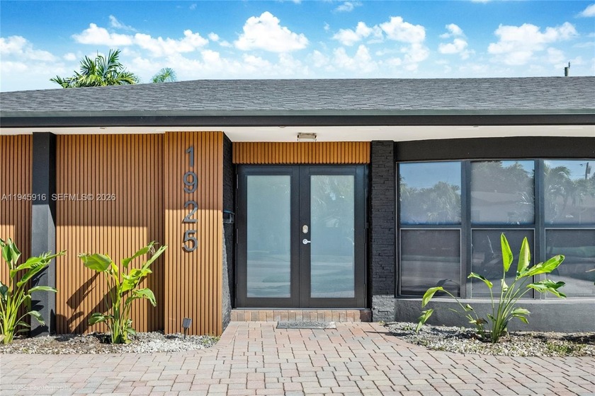Completely renovated 6-bedroom, 4-bathroom residence located in - Beach Home for sale in Miami, Florida on Beachhouse.com