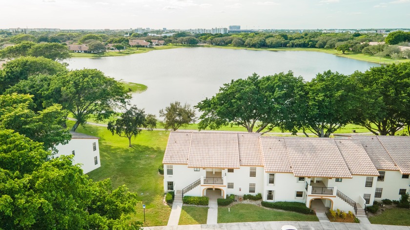 Enjoy panoramic lake views from this bright, true end unit in - Beach Condo for sale in Boca Raton, Florida on Beachhouse.com