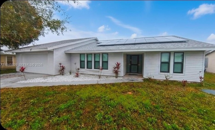 Beautifully renovated turnkey 3-bedroom, 2-bath residence - Beach Home for sale in Port Saint Lucie, Florida on Beachhouse.com