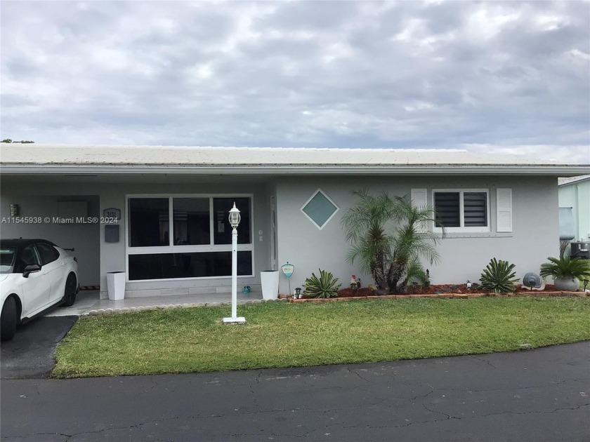 Impeccably renovated and beautifully upgraded. This - Beach Home for sale in Hollywood, Florida on Beachhouse.com