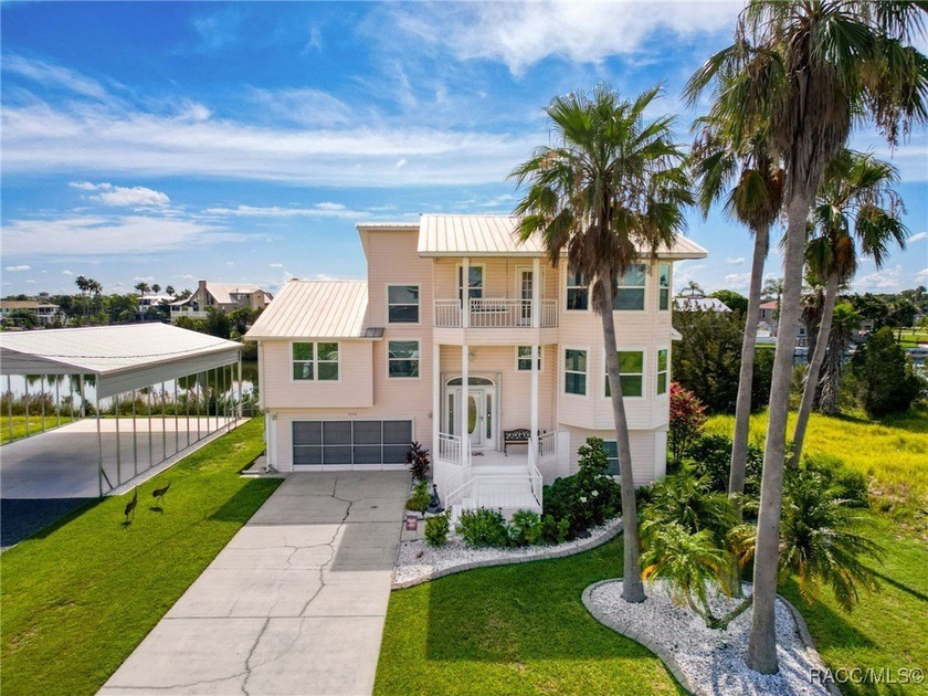 Welcome to your waterfront retreat in Hernando Beach! This - Beach Home for sale in Hernando Beach, Florida on Beachhouse.com